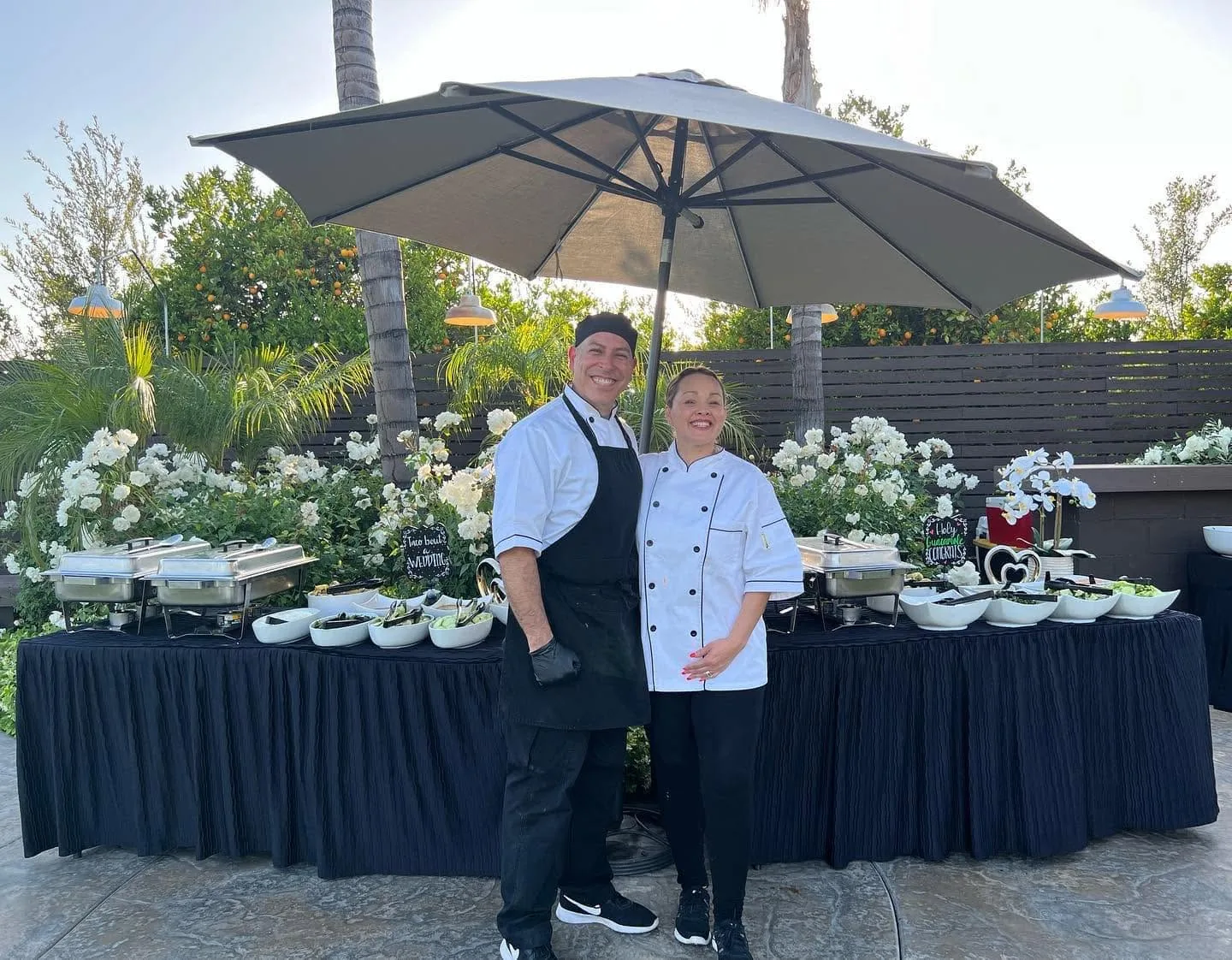Jessica's Taco Man catering team at an outdoor wedding setup